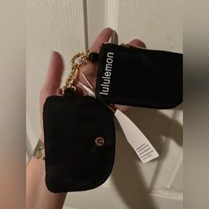 NWT! Lululemon Double Detachable Black and Gold Wristlet!
